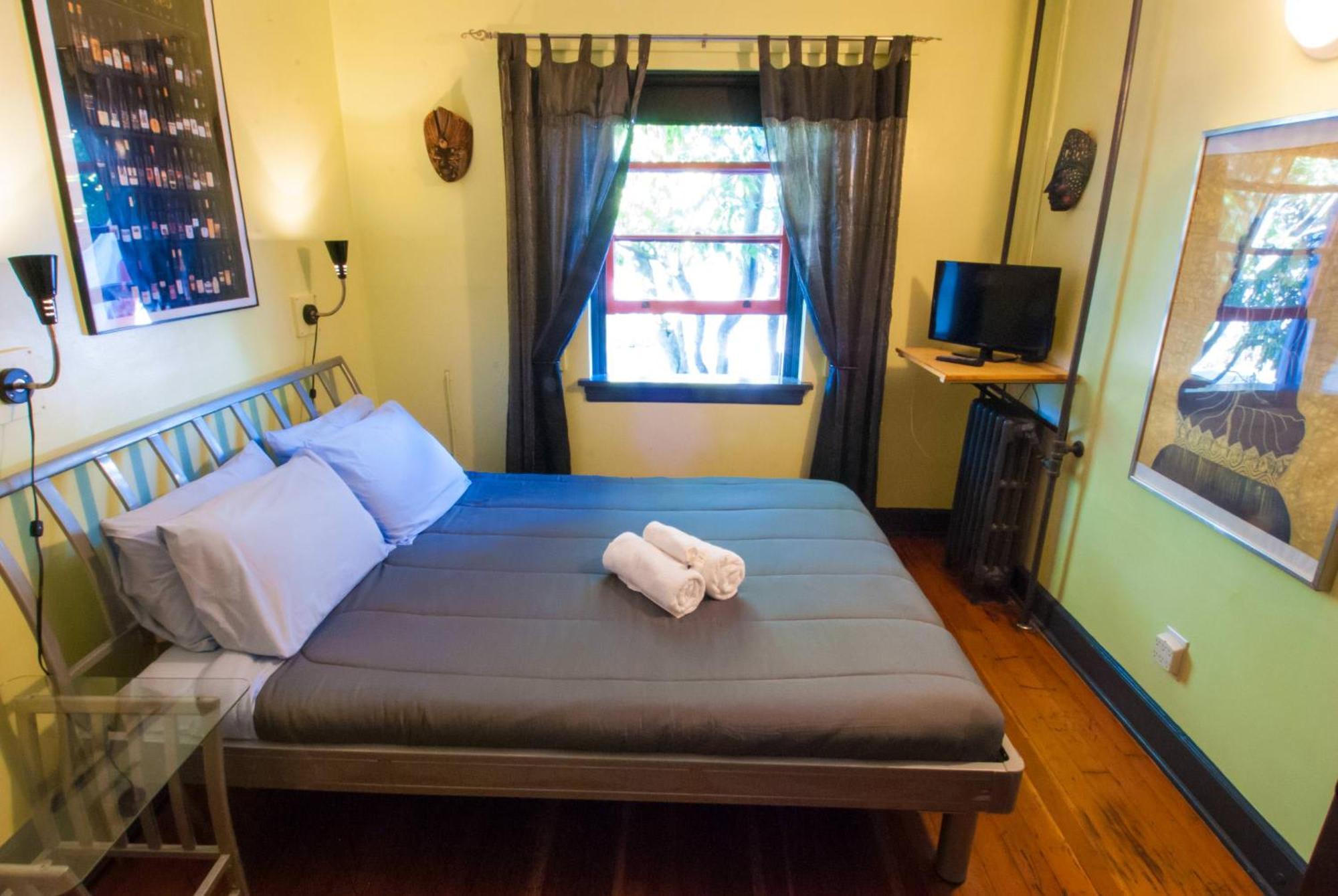 Ocean Island Inn | Backpackers | Suites Вікторія Номер фото